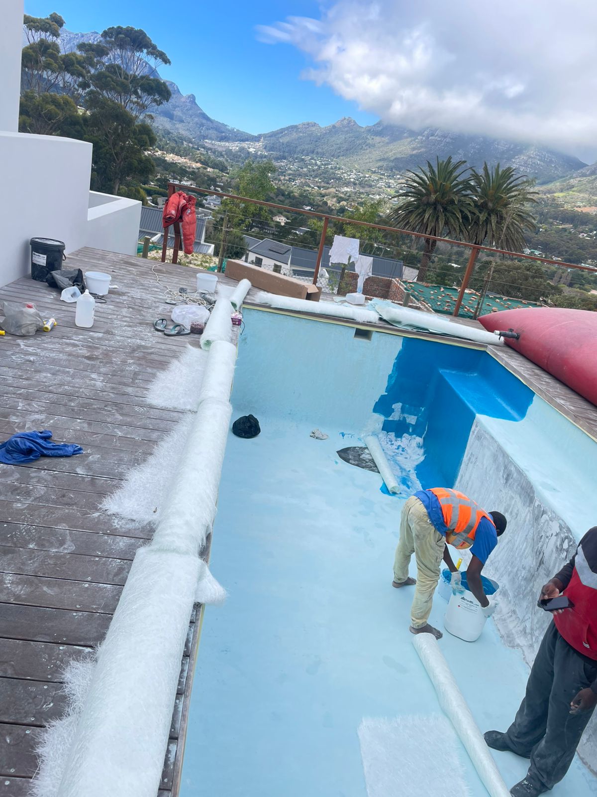 Ocean Blue team working on a water storage installation